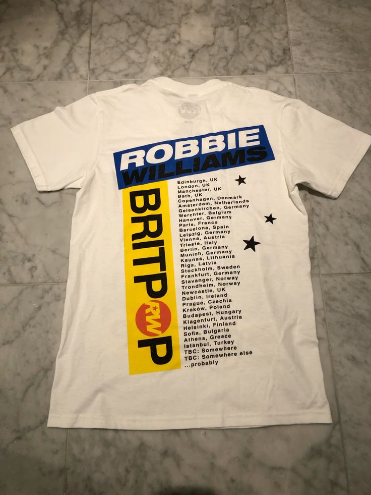 🖤🔥 CAMISETA ROBBIE WILLIAMS – EL ESTILO DE UNA LEYENDA 🎤✨